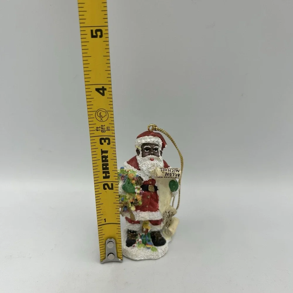 The International‎ Santa Claus Collection 1997 African American Santa Flawed
